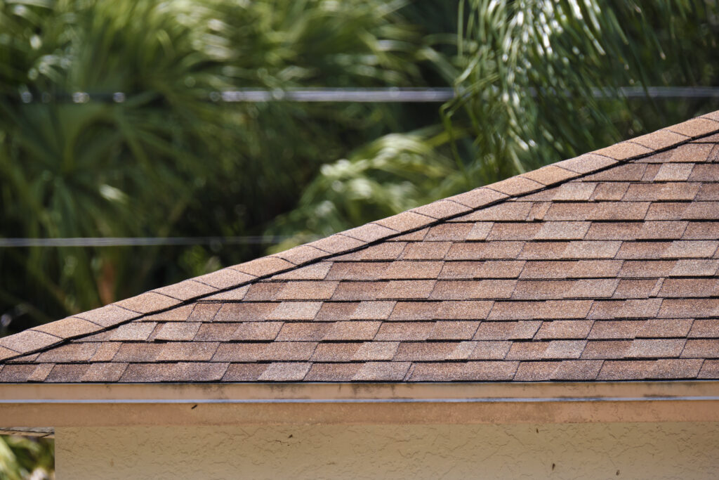 
closeup-of-house-roof-top-covered-with-asphalt-what-roof-material-lasts-the-longest-berry-roofing-riverside-