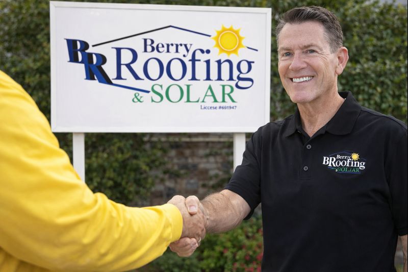 Berry Roofing & Solar sales representative shaking hands with a homeowner in Riverside, California after a roof inspection and repair consultation