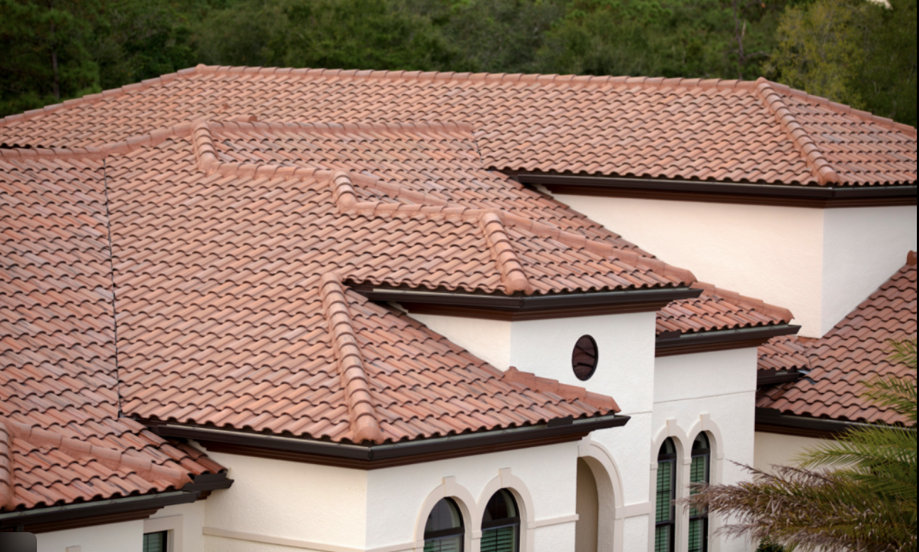 Eagle Concrete Tile Capistrano Terracotta roof installed on a residential home in Riverside, California with a classic Mediterranean architectural design.
